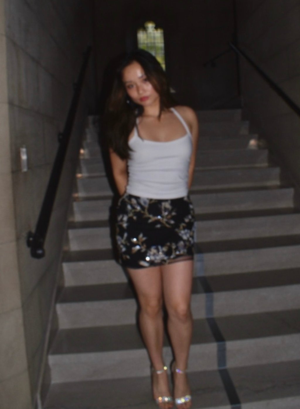 Cherish — sequin mini skirt on stairs